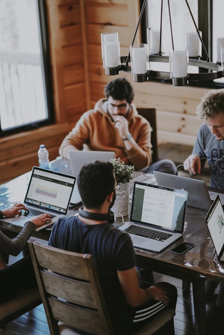Diverse team working together at a shared desk